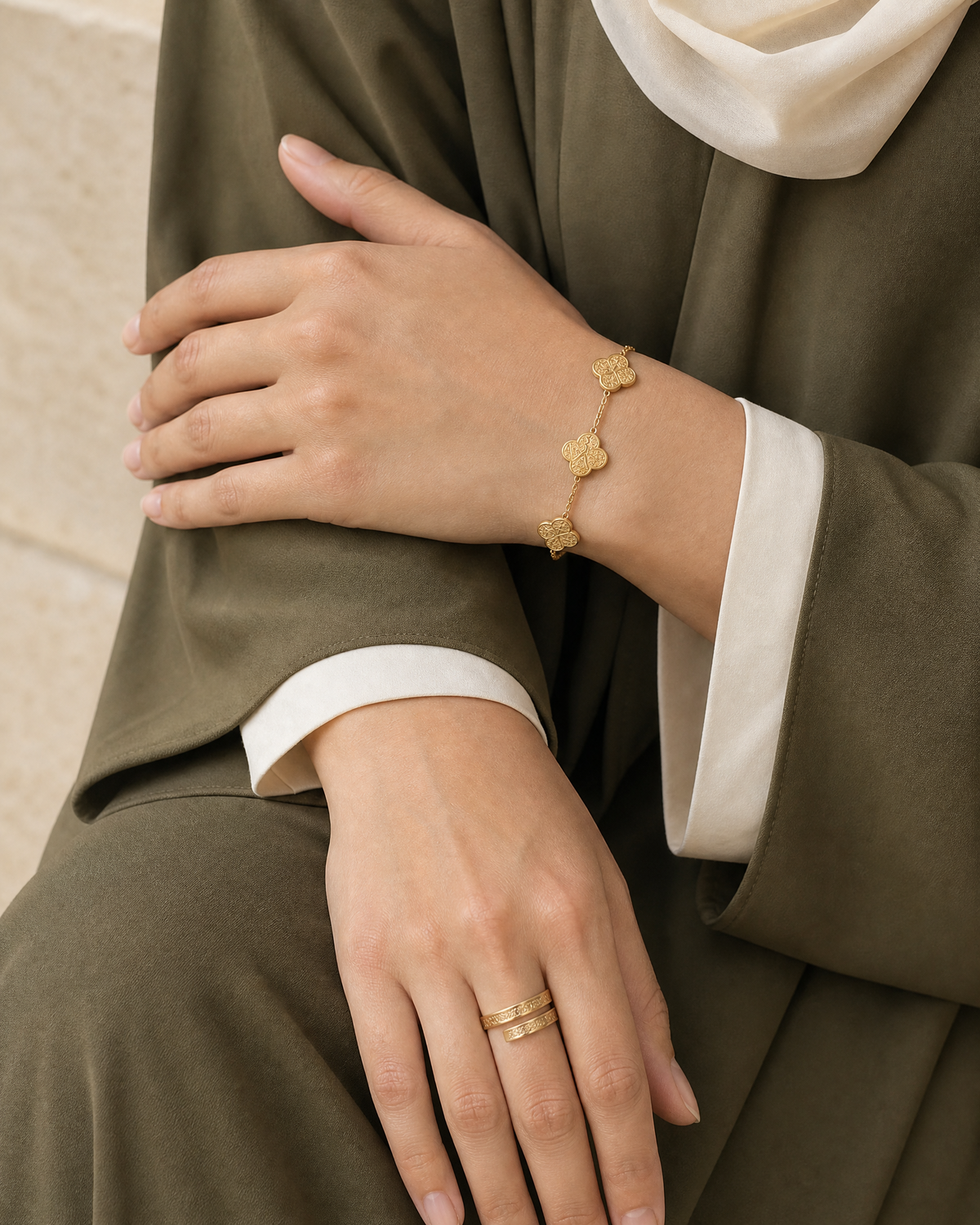 Ayat al-Kursi bracelet and ring worn together, close detail